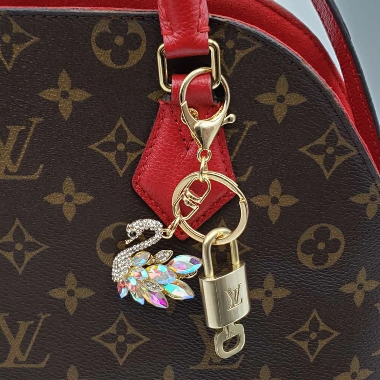 100% Auth Louis Vuitton Lock & Key with unbranded Bagcharm, Keycharm, Keychain