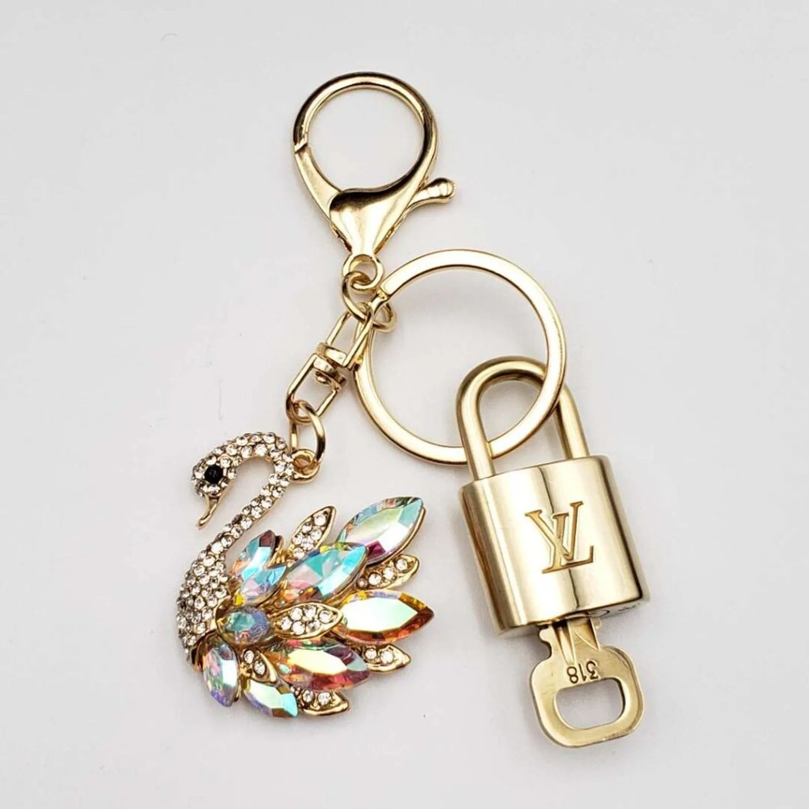 100% Auth Louis Vuitton Lock & Key with unbranded Bagcharm, Keycharm, Keychain