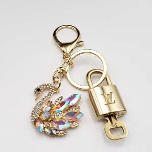 100% Auth Louis Vuitton Lock & Key with unbranded Bagcharm, Keycharm, Keychain