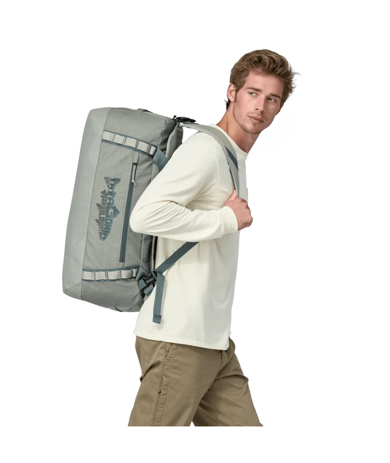 BLACK HOLE 55L DUFFEL - WILD WATERLINE:SLEET GREEN