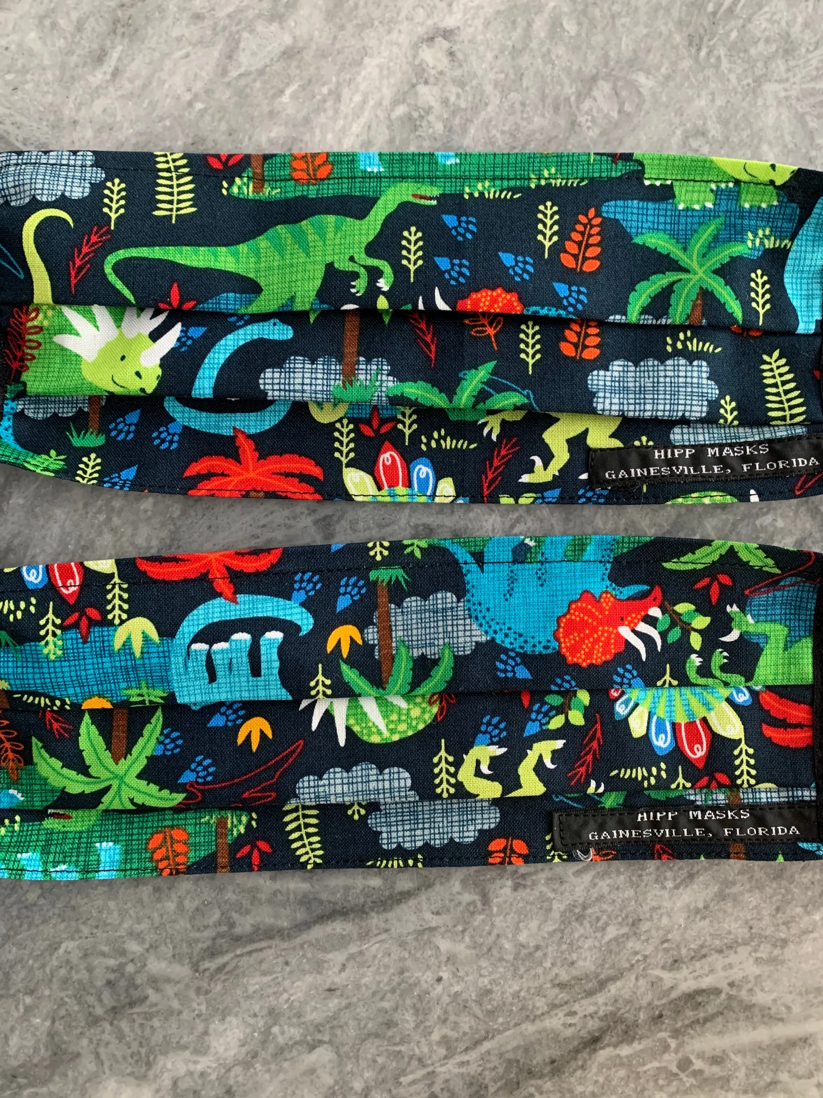 Florida Museum of Natural History:  Children's or Adult Sized Navy Dinosaur Print with Navy Foldover Elastic for Ears