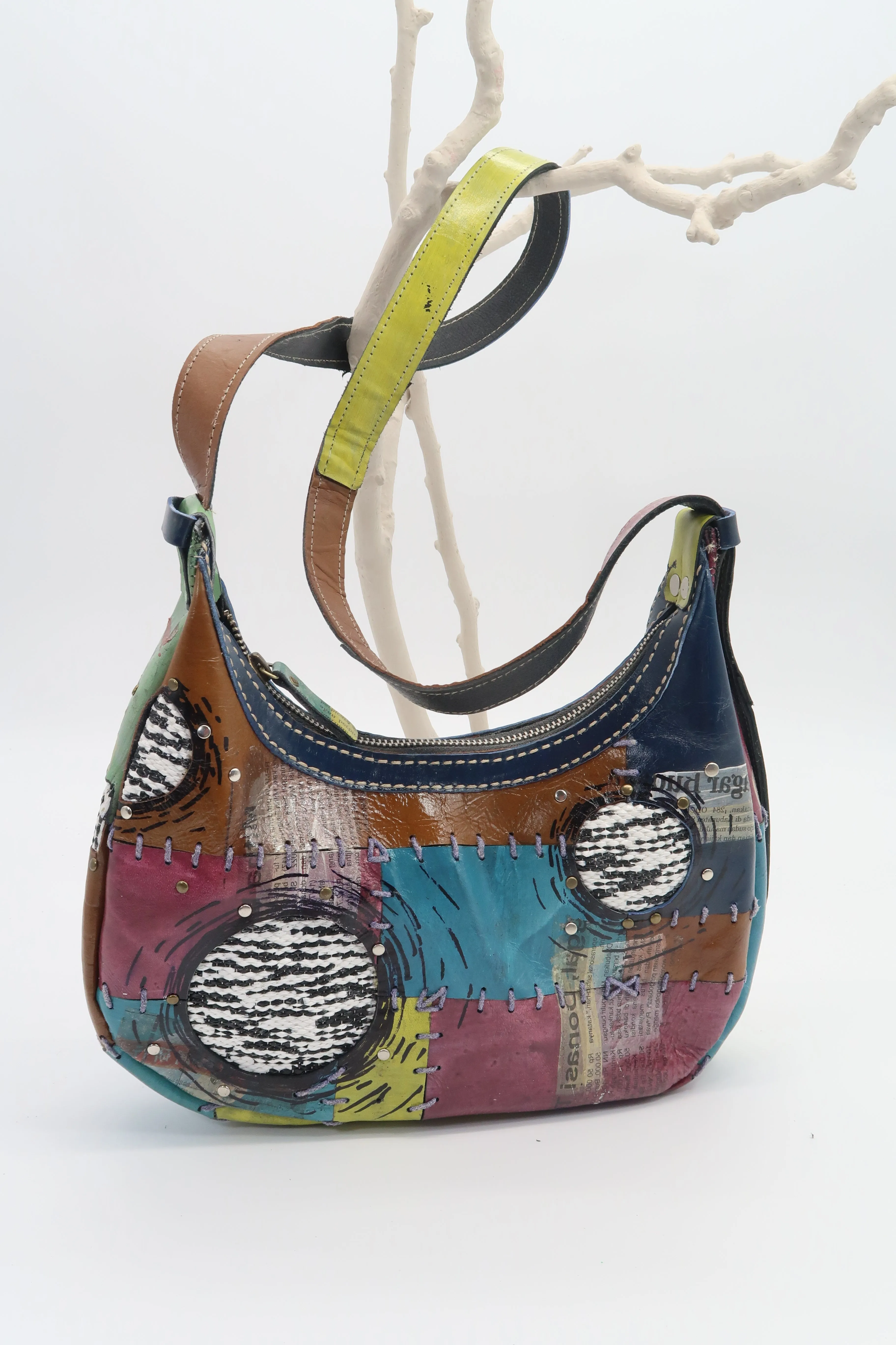 Hand Crafted recycled leather with recycled plastic hand bag