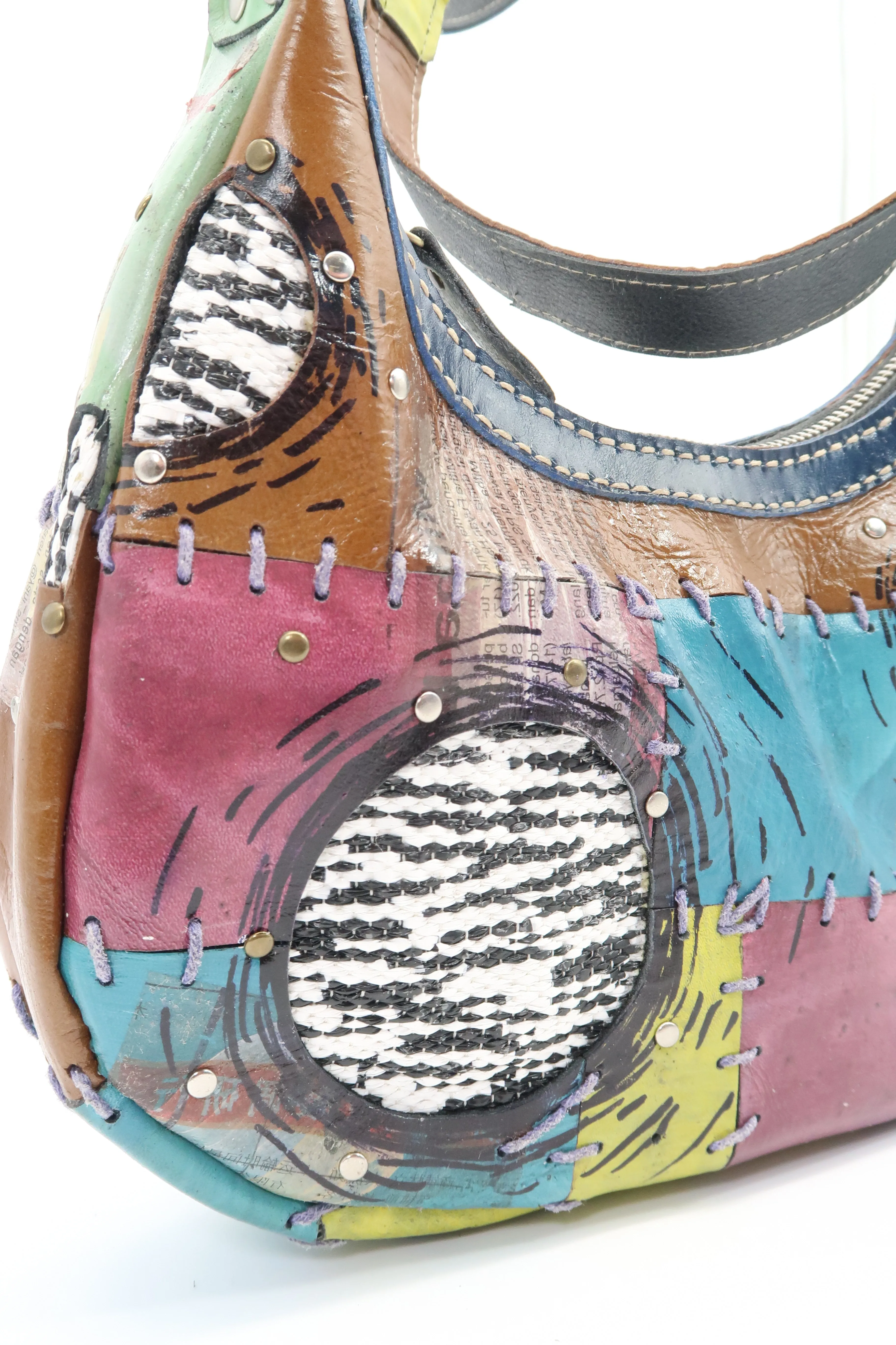 Hand Crafted recycled leather with recycled plastic hand bag